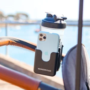 Porte gobelets et téléphone